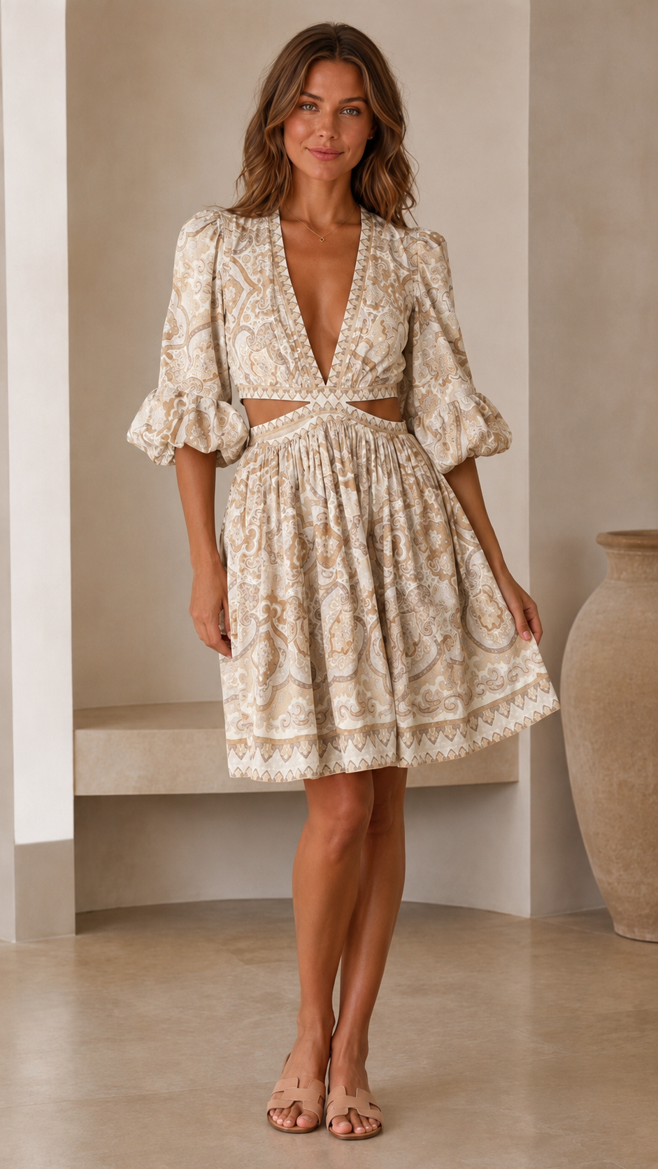 Cream printed mini dress with puff sleeves and side waist cutouts front view