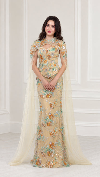 Front full view of Champagne floral embroidered evening gown with attached floor-length cape