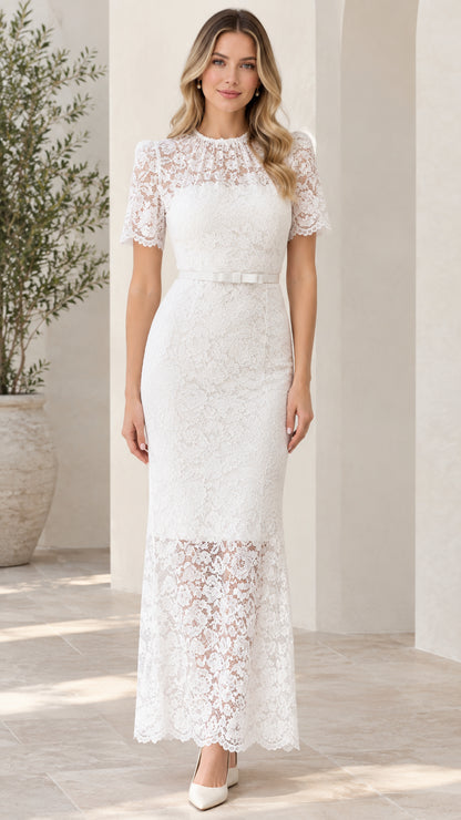 Front view of woman wearing white short sleeve floral lace maxi dress