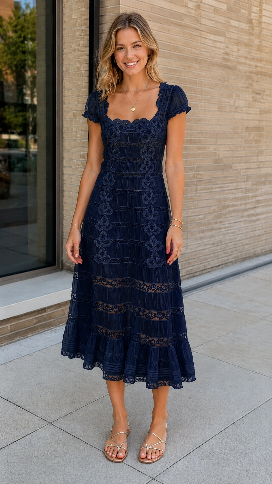 Front view of navy scallop neck lace panel midi dress with short puff sleeves