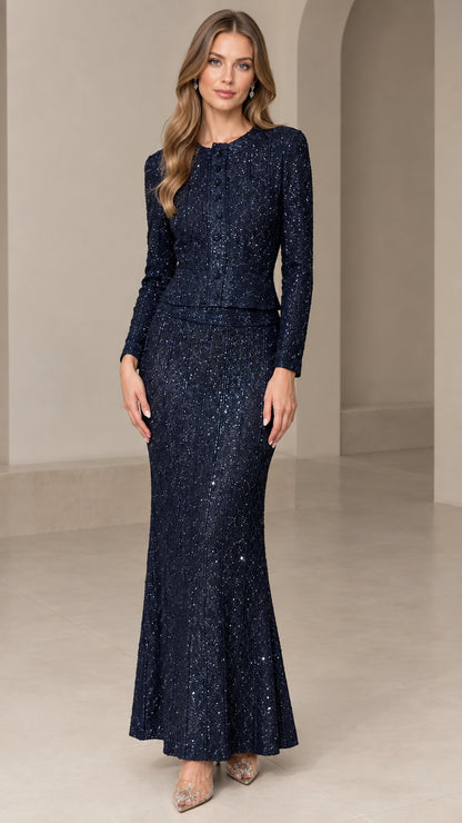 Front view of model wearing Navy Blue sequin long sleeve jacket and maxi skirt formal dress set