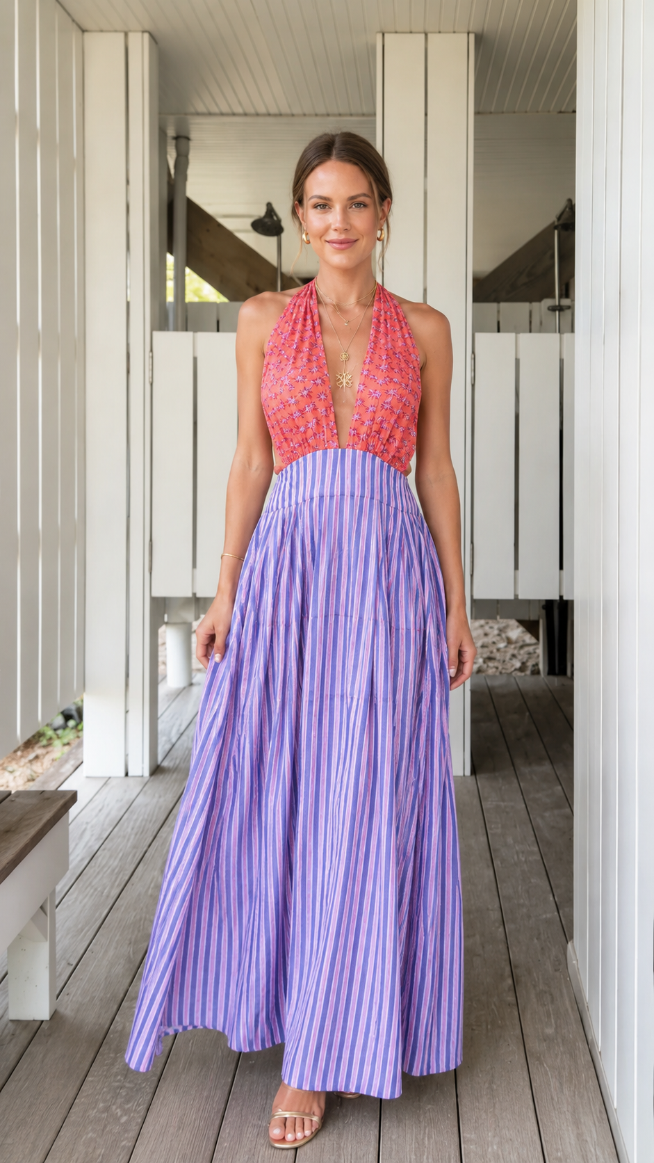 Front view of coral and lavender pleated halter backless maxi dress