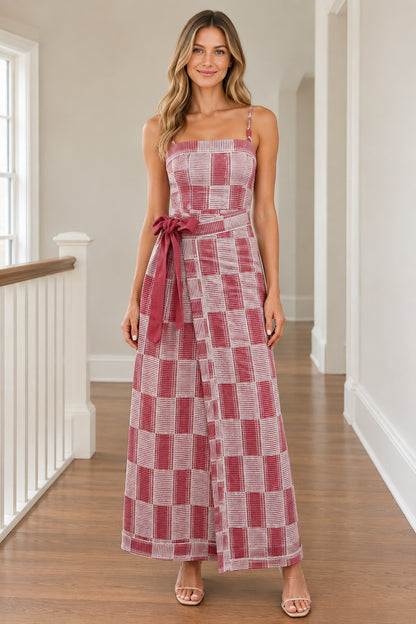 Front view of woman wearing Dusty Rose geometric plaid wide-leg jumpsuit with waist tie
