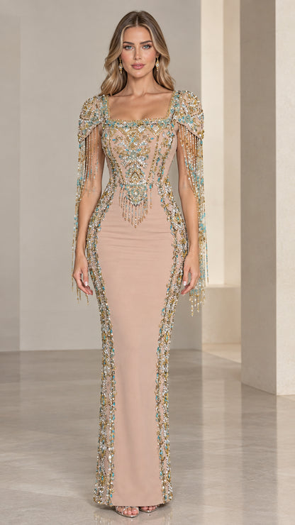 Front view of model wearing Nude square neck embellished evening gown with beaded fringe sleeves
