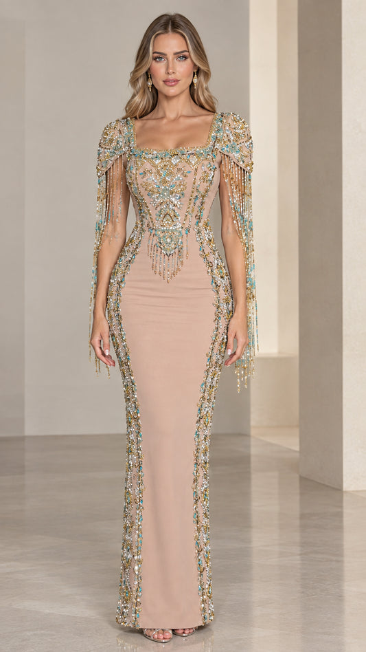 Front view of model wearing Nude square neck embellished evening gown with beaded fringe sleeves