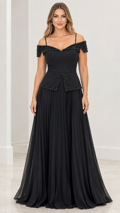 Front view of black cold-shoulder beaded pleated evening gown