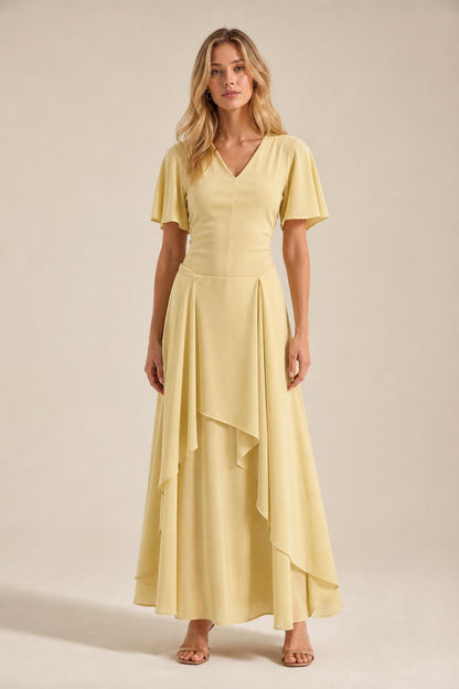 Front view of model wearing yellow V-neck flutter sleeve maxi dress