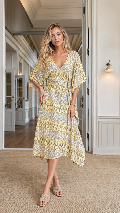 Front view of butter yellow abstract print V-neck kimono sleeve asymmetric midi dress