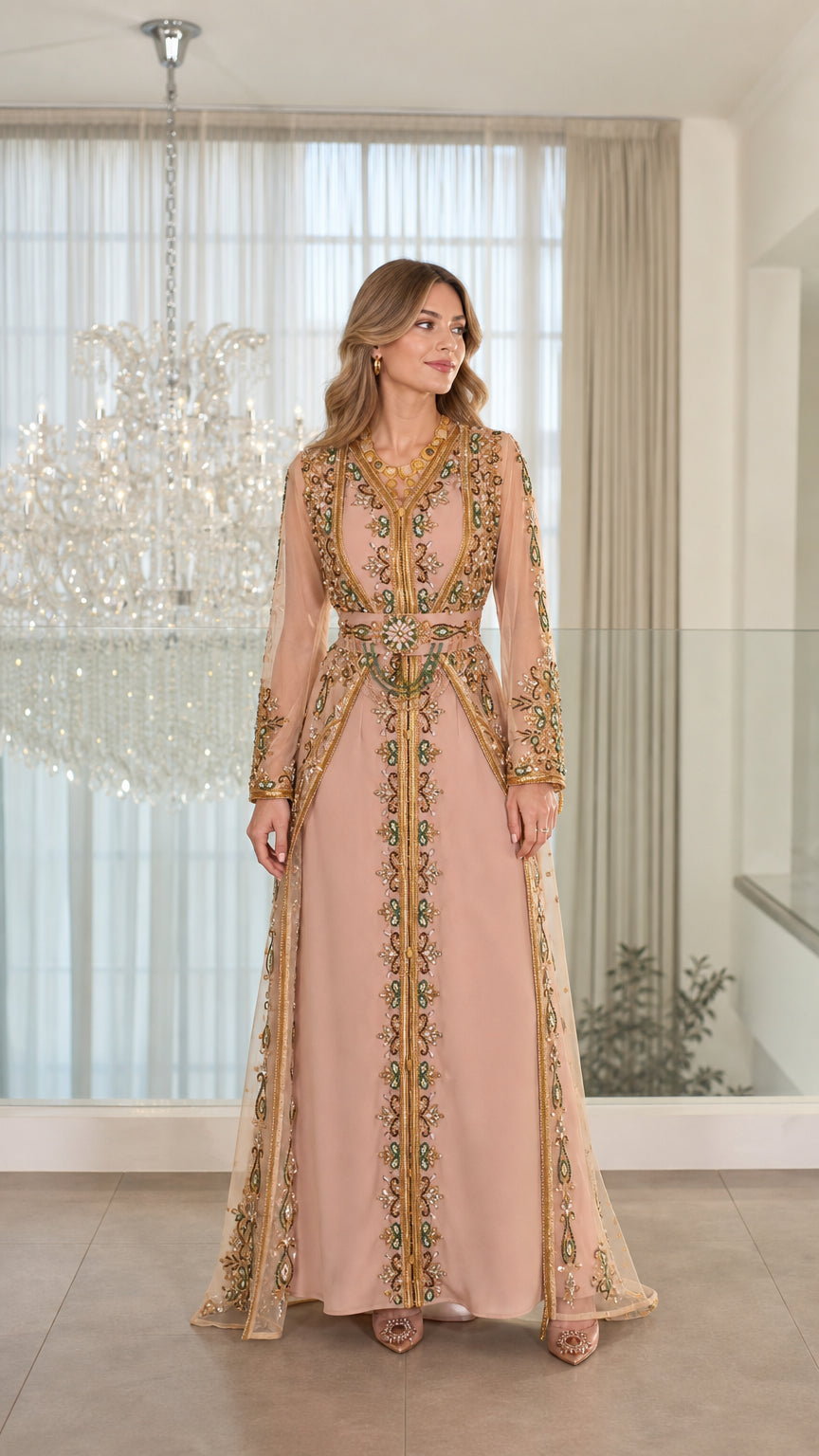 Front full-length view of model wearing dusty pink embroidered Moroccan kaftan evening dress with embellished belt