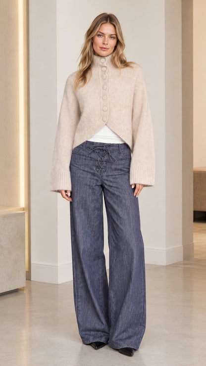 Women's beige high neck fuzzy knit cardigan front view with cutaway hem and wide leg pants