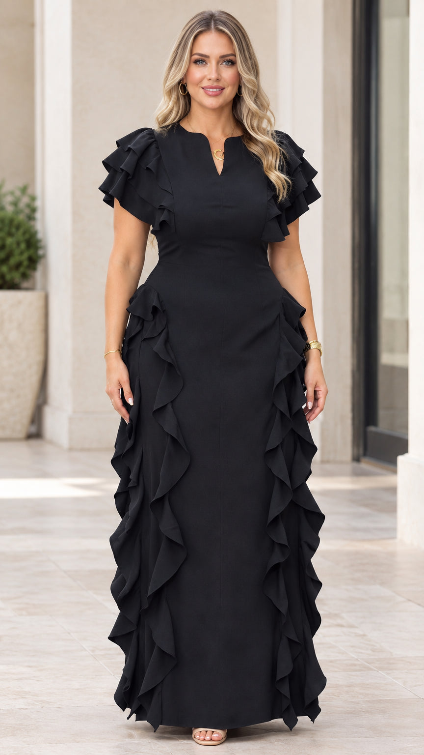 Front view of model wearing black flutter sleeve maxi dress with side ruffles
