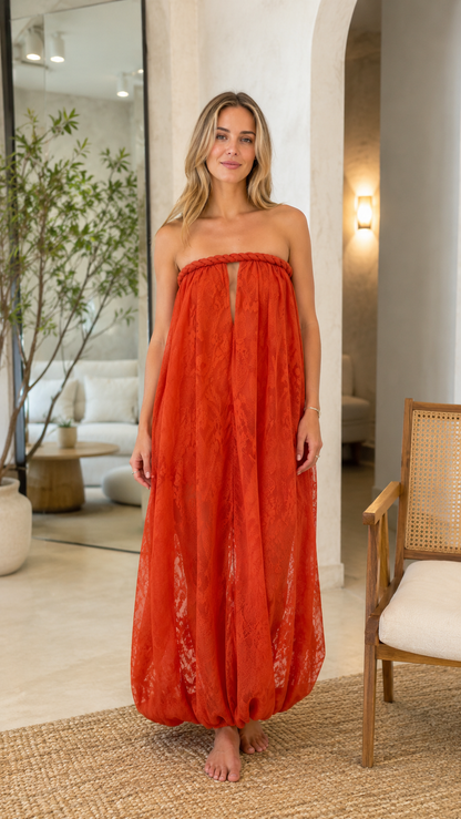 Front view of burnt orange strapless textured maxi dress with keyhole front and bubble hem