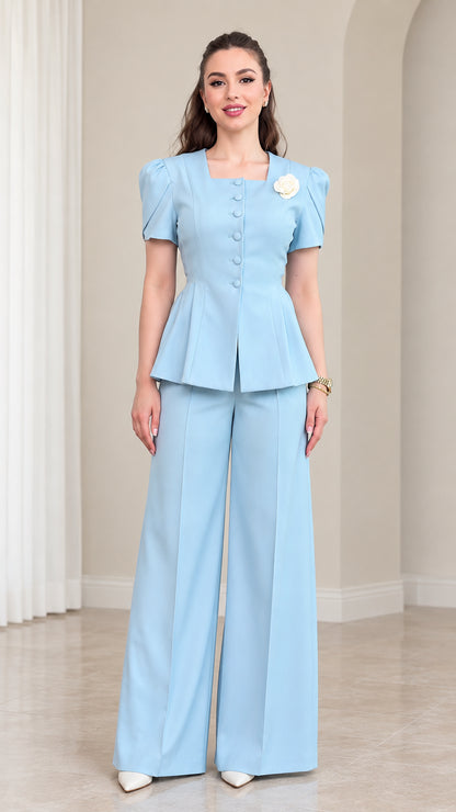 Front view of model wearing Sky Blue short sleeve peplum top and wide leg pants set