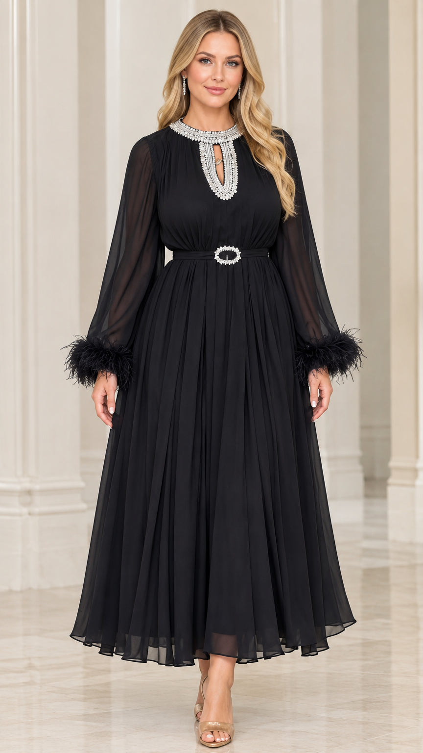 Front view of black pleated chiffon maxi dress with crystal neckline and feather cuffs