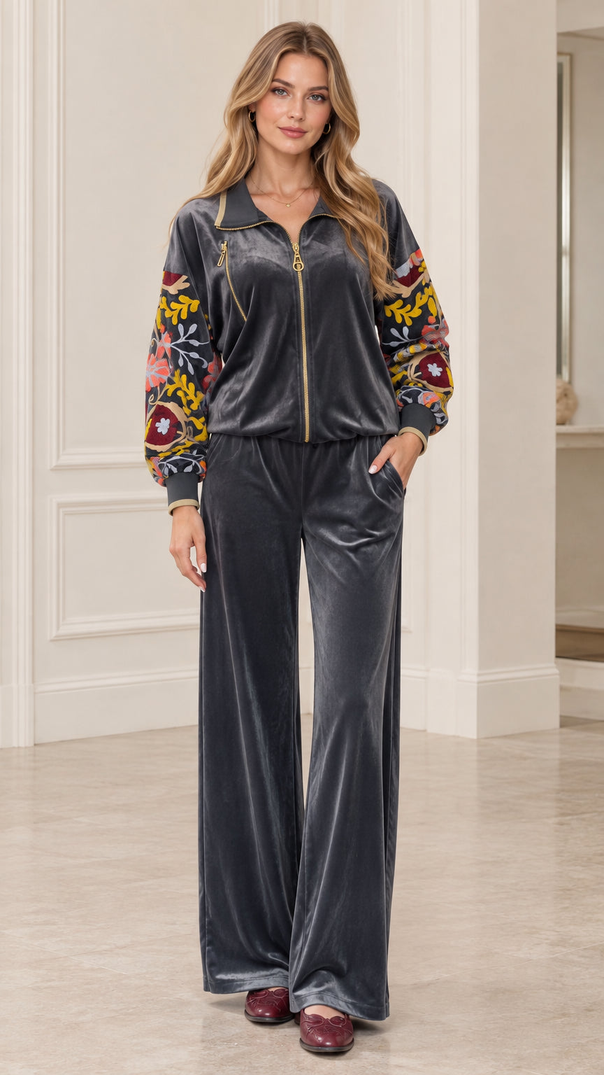 Women's charcoal velvet tracksuit set front view showing floral embroidered sleeves