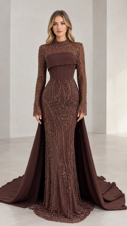 Front view of woman wearing brown beaded high neck evening gown with corset bodice and train