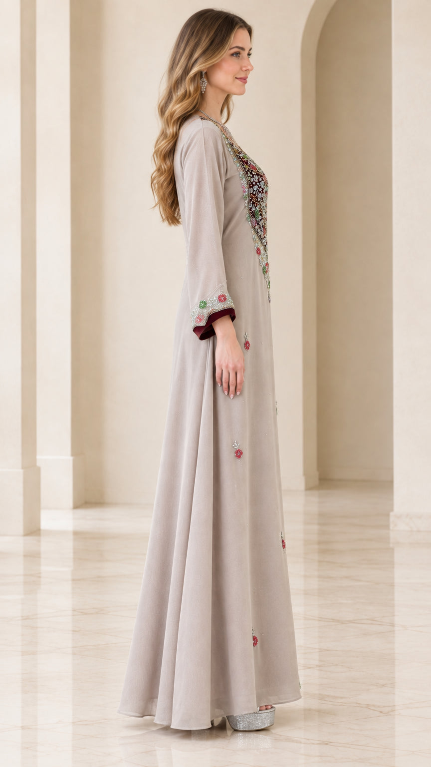 Side profile of beige embroidered A-line maxi dress