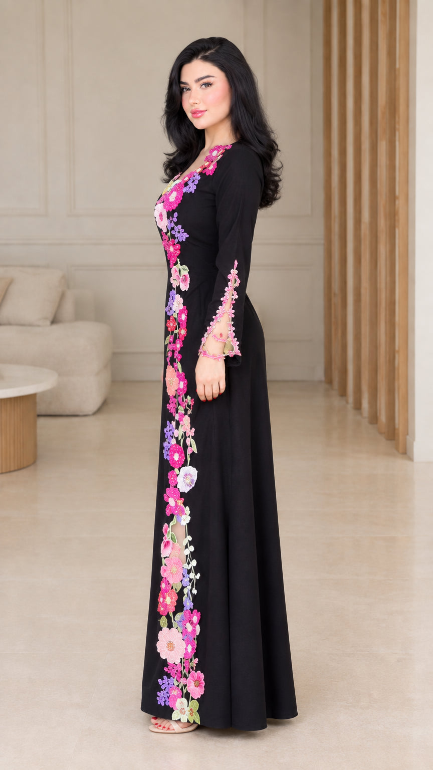 Side angle of black floral embroidered long sleeve maxi dress