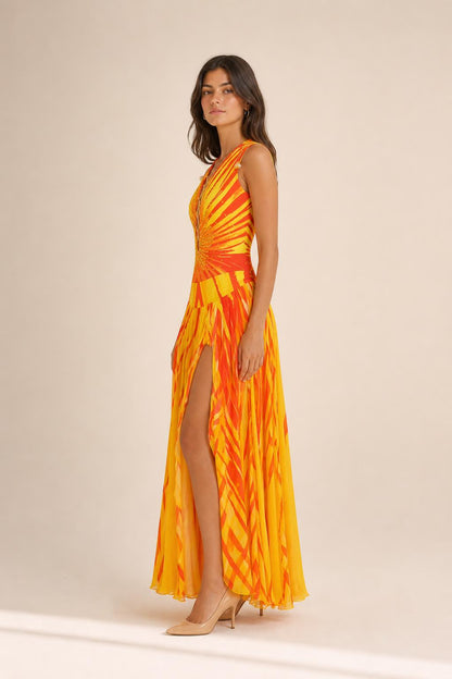 Side profile of yellow maxi dress with high slit
