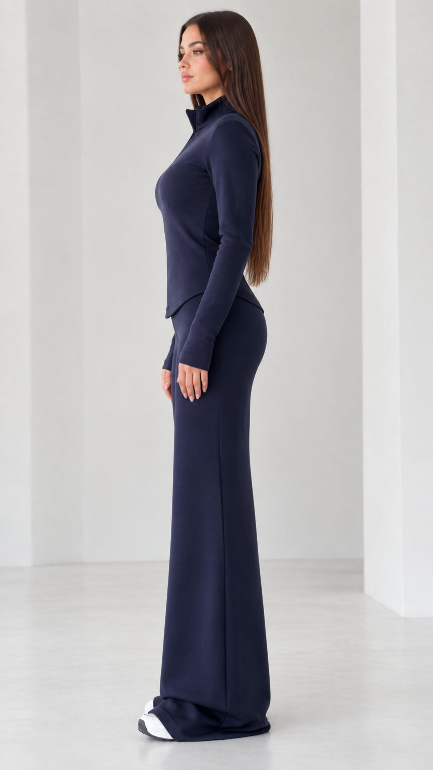 Side profile of women's navy blue two-piece casual lounge set