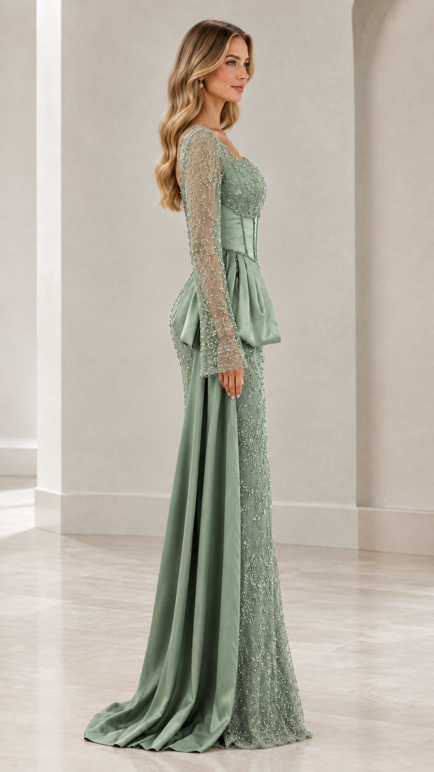 Side profile of sage green long sleeve formal gown showing cascading satin sash detail