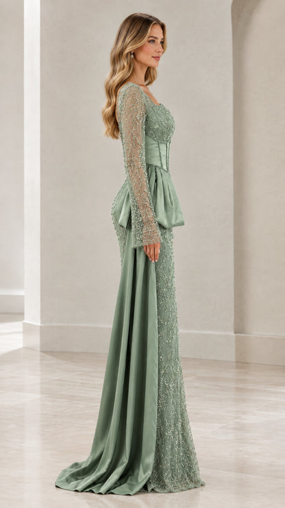 Side profile of sage green long sleeve formal gown showing cascading satin sash detail
