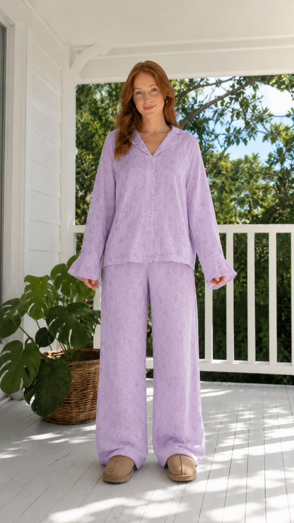 Front view of lavender floral lounge set with relaxed long sleeve top and wide leg pants