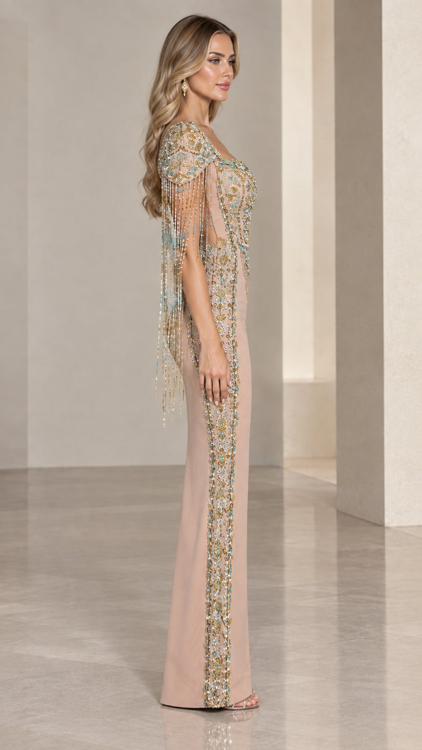Side profile of model wearing Nude floor-length beaded evening gown