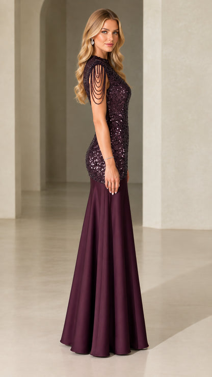 Side angle view of burgundy sequined mermaid formal dress