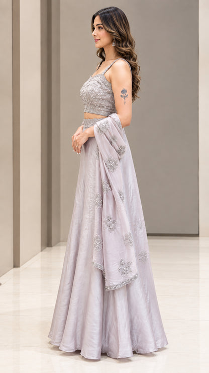 Side profile view of woman modeling Silver Grey wide-leg festive trouser set
