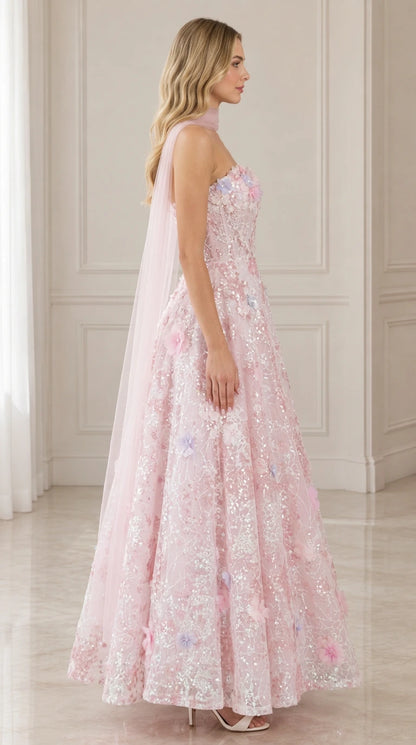 Side profile of pink strapless floral embroidered A-line maxi dress