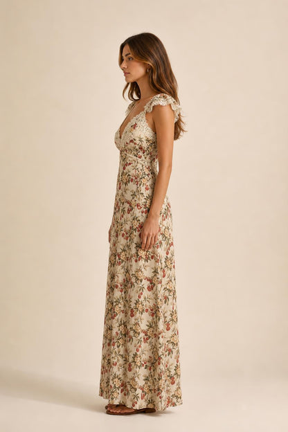 Side profile of beige floral print maxi dress
