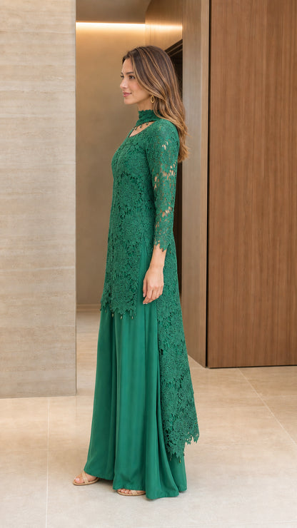Side profile view of emerald green floral lace high-low tunic and palazzo pants