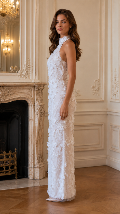 Side view of white textured floral halter maxi dress