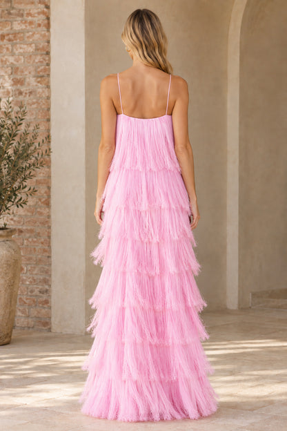 Back view of woman wearing pink tiered fringe sleeveless maxi dress