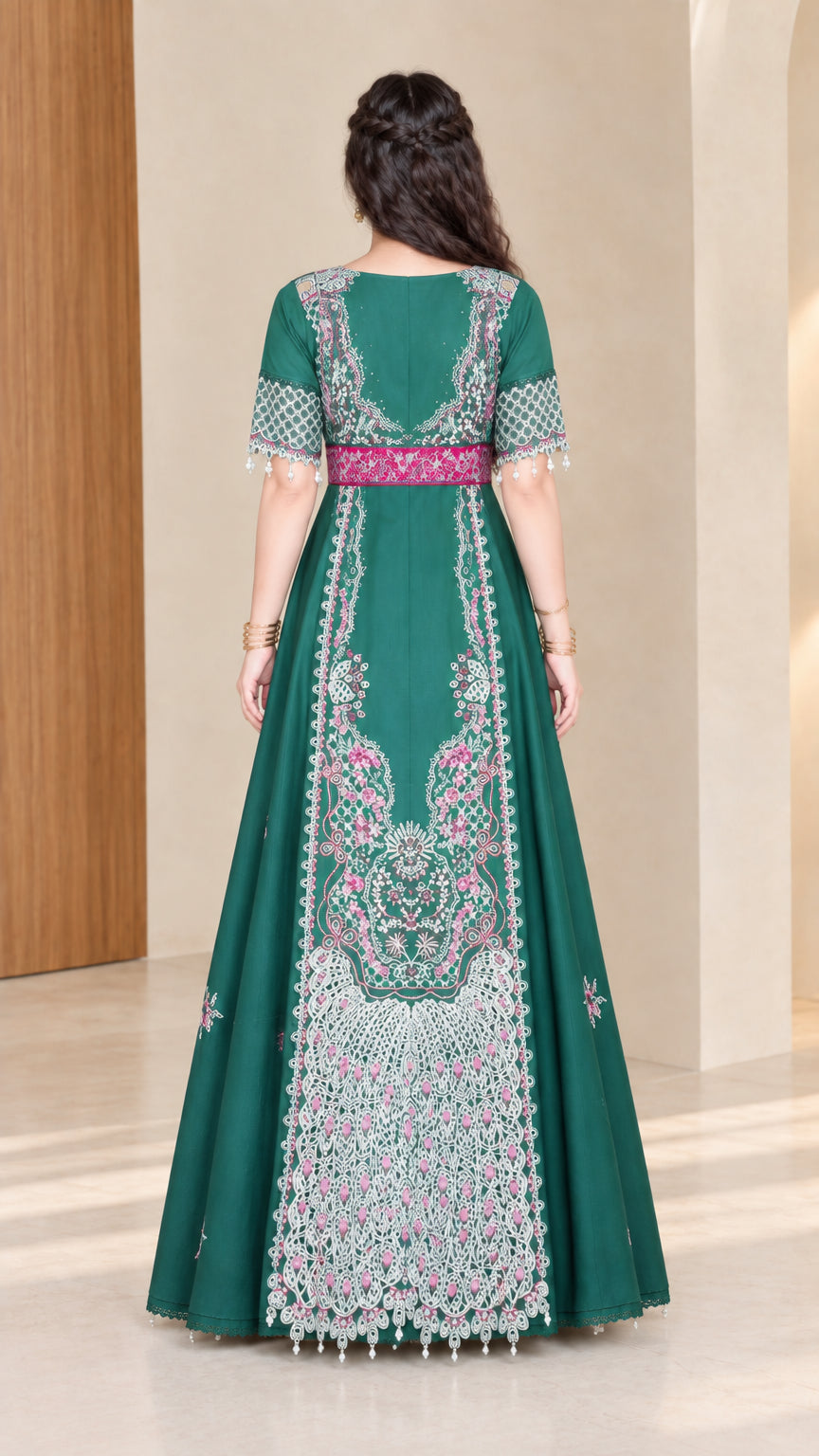 Back full view of woman wearing emerald green embroidered maxi gown