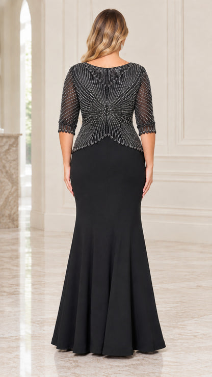 Back view of black sequined evening dress showcasing fitted silhouette and back zipper