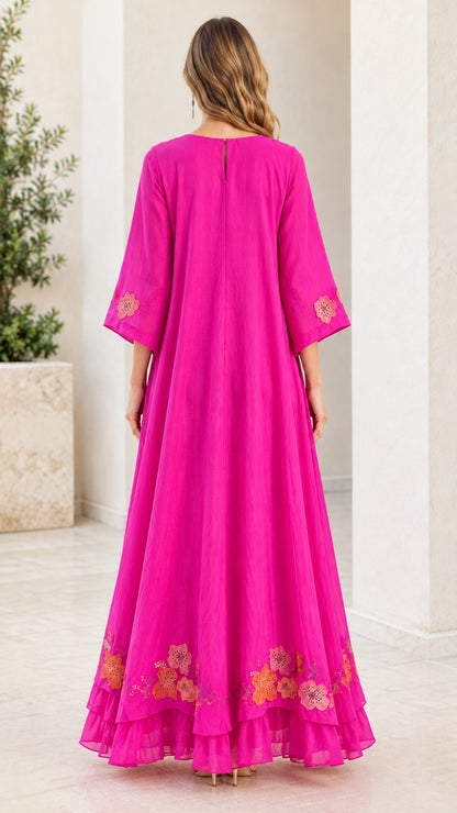 Back view of fuchsia long kaftan dress with tiered ruffle hem