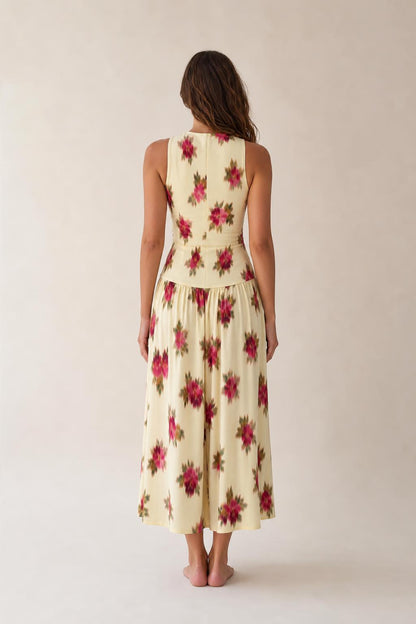 Back view of woman wearing Floral Cream midi dress