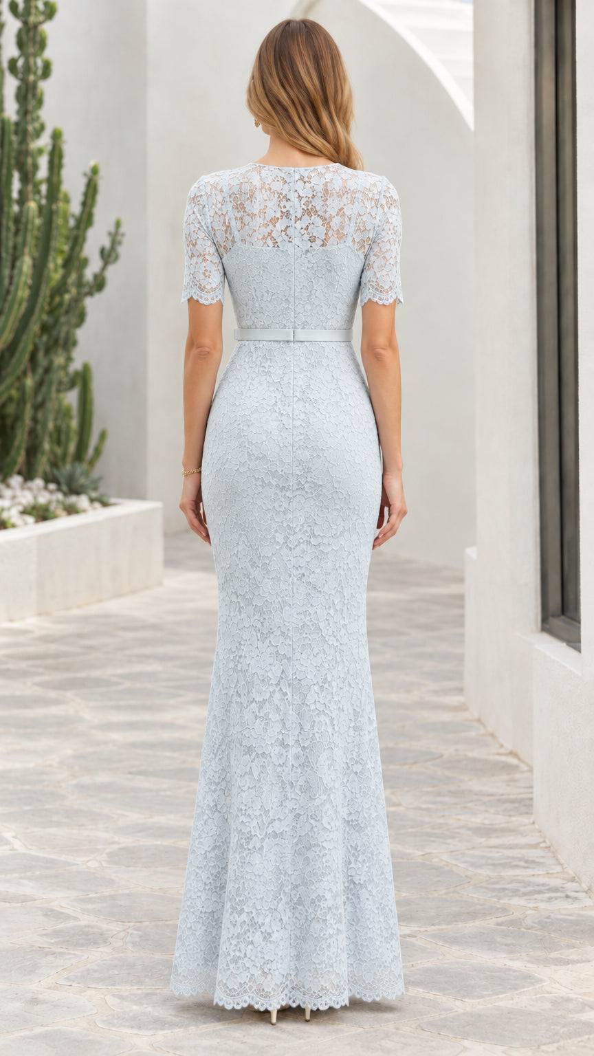 Back full view of light blue floor-length lace evening gown