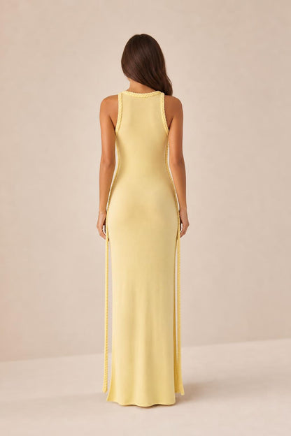 Back view of model wearing yellow maxi dress
