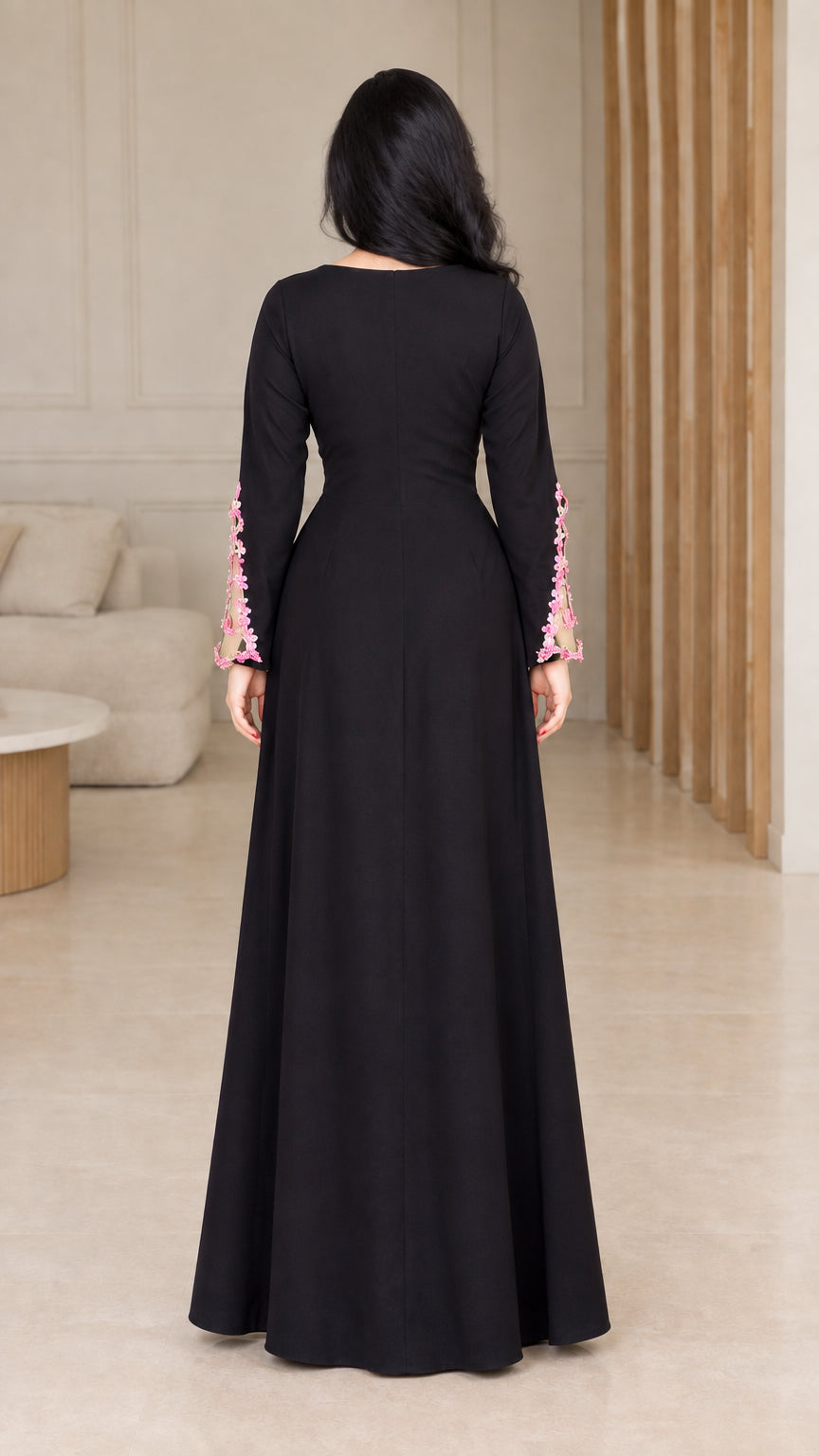 Back view of black long sleeve evening maxi dress