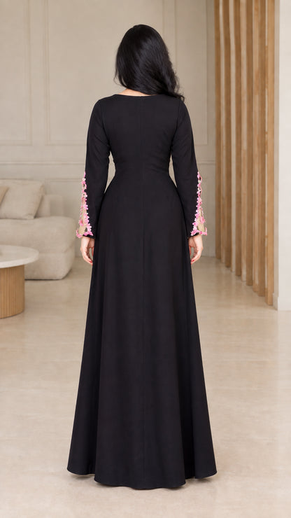 Back view of black long sleeve evening maxi dress