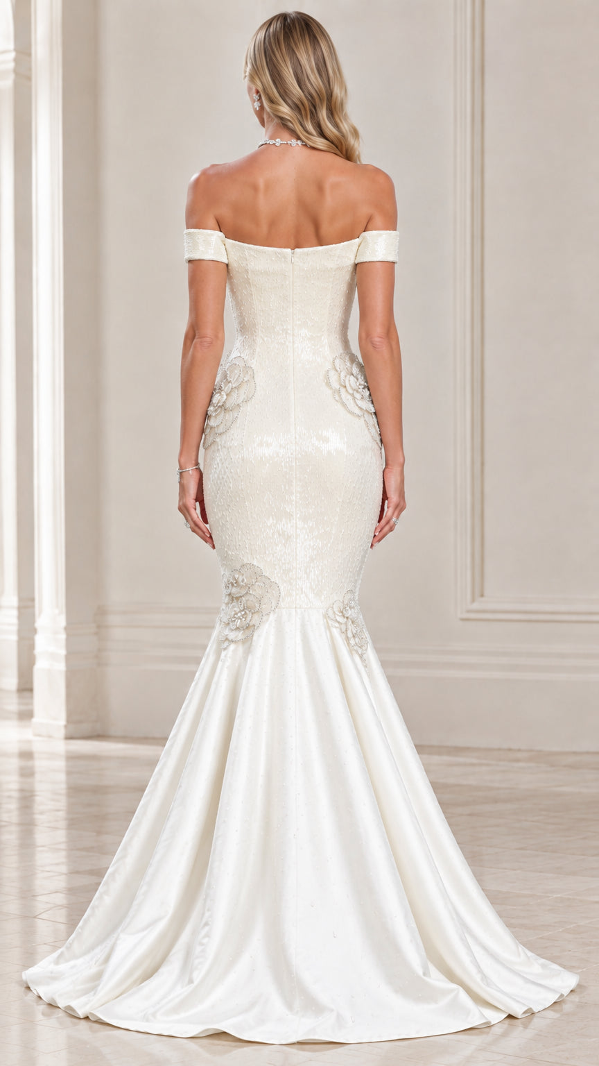 Back view of ivory off-the-shoulder formal mermaid gown showing flared skirt