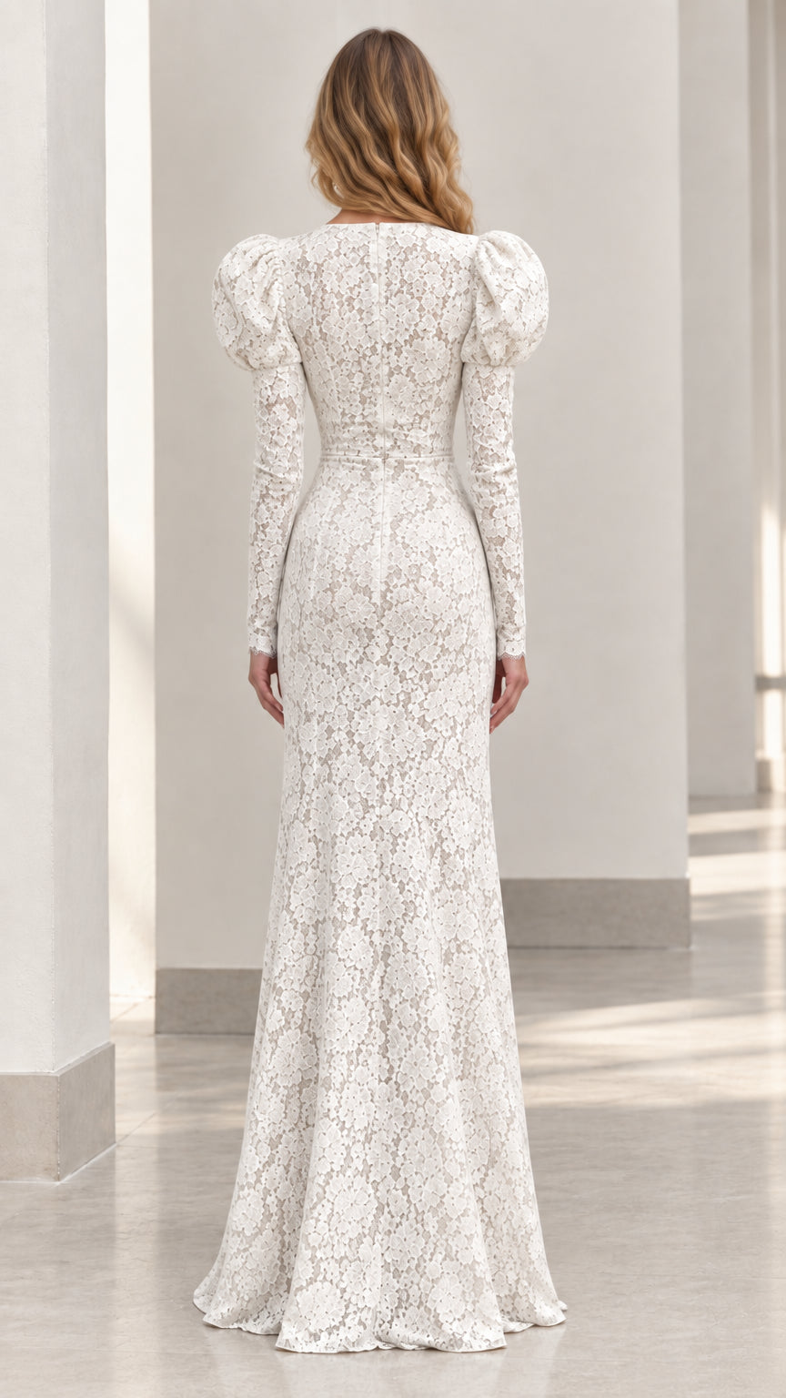 Back view of floor-length white lace dress showing elegant fit