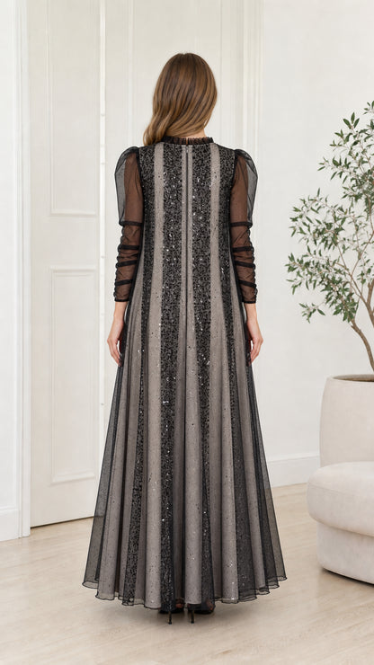 Back view of the Silver Gray striped sequin maxi dress with sheer sleeves