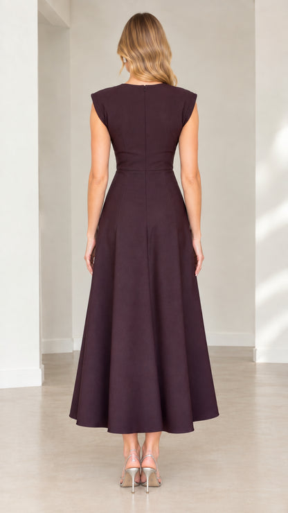 Back view of plum cap sleeve midi dress showing clean tailored lines and zipper closure