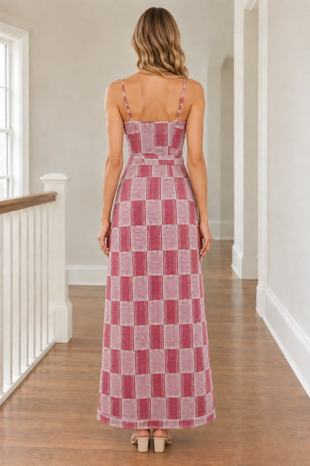 Back view of woman wearing Dusty Rose plaid full-length wide-leg jumpsuit