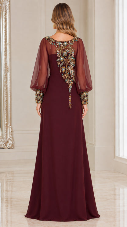 Back view of burgundy formal dress showing sheer sleeve and back embroidery details