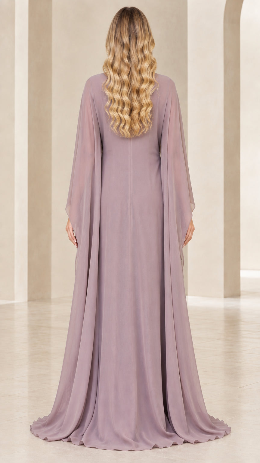 Back view of dusty mauve flowing chiffon cape gown